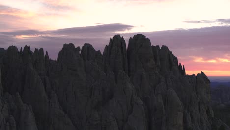 Drone-flying-towards-Cathedral-Spires,-granite-peaks