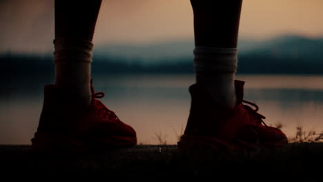 sunset view with red sneakers