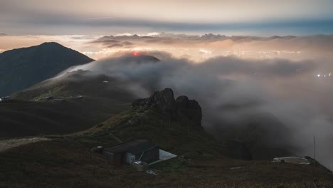 Landscape-time-lapse-hyper-lapse-of-sunset-with-colorful-clouds-and-beautiful-coastline-from-above-on-Sunset-Peak,-Hong-Kong