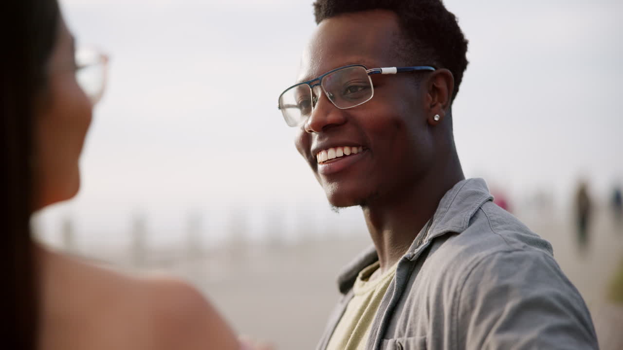 Happy couple sharing a romantic moment at the beach