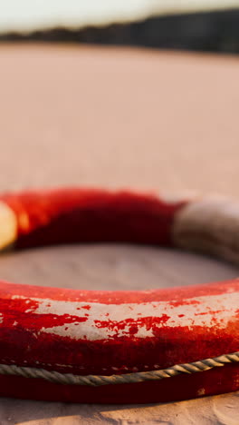 close-up of a life ring on the beach