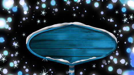 animation of blue sign with copy space and christmas fairy lights flickering over black background