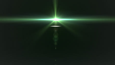 digital animation of green spot of light moving against copy space on blue background