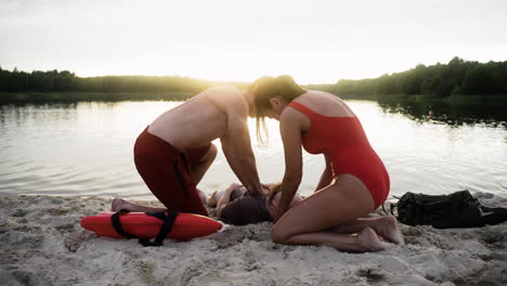 team of lifeguards trying to save man's life