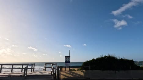 a serene beach scene with clear skies