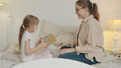mother and daughter exchange gift