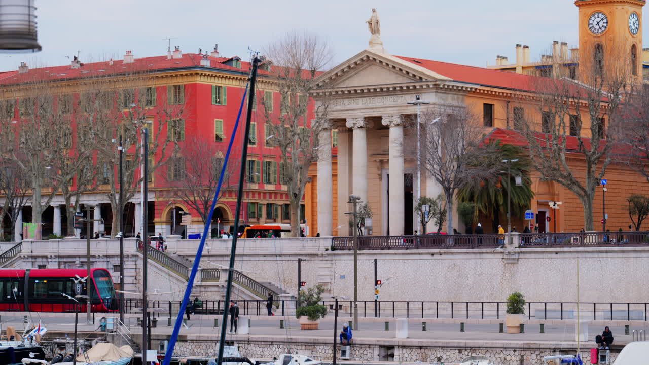 Nice, France - February 4, 2025: White boats docked in Port Lympia, overlooking the city