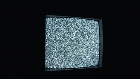 TV-static-and-noise-glitch-on-VCR-television-screen-with-bad-signal