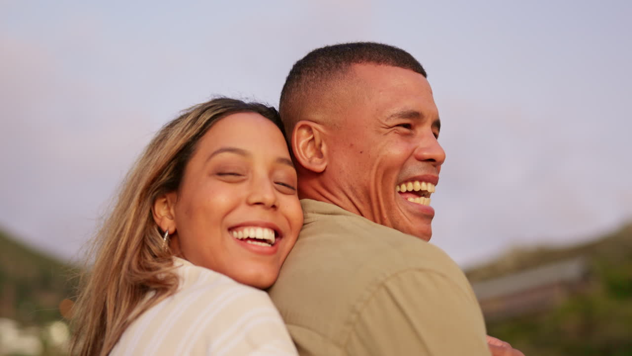 Laugh, happy and couple hug in nature for romance