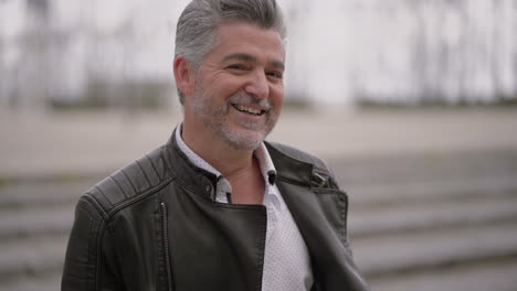 cheerful mature man looking at camera