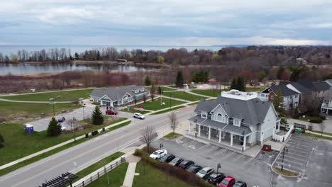 Drone-circling-over-lakeside-road-in-the-winter