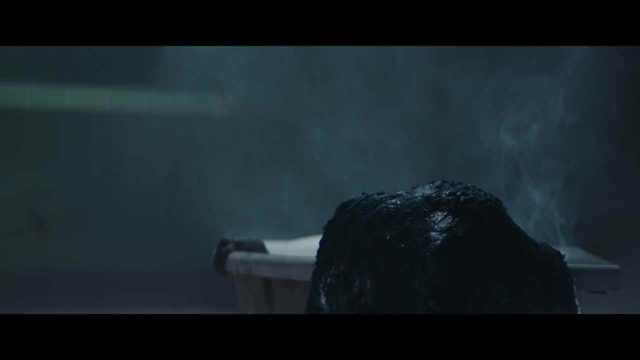 A siren appears form the bathtub with hot water