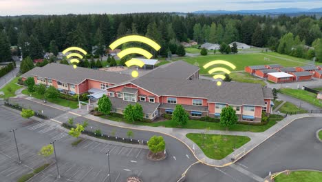 yellow wifi symbols appearing over a grade school in america, internet is foundational to modern education