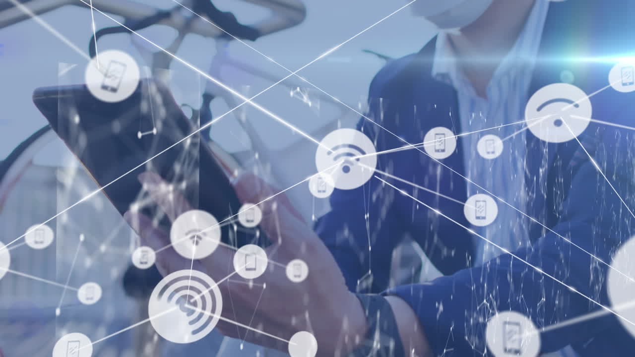 Network of digital icons against asian businessman wearing face mask using digital tablet