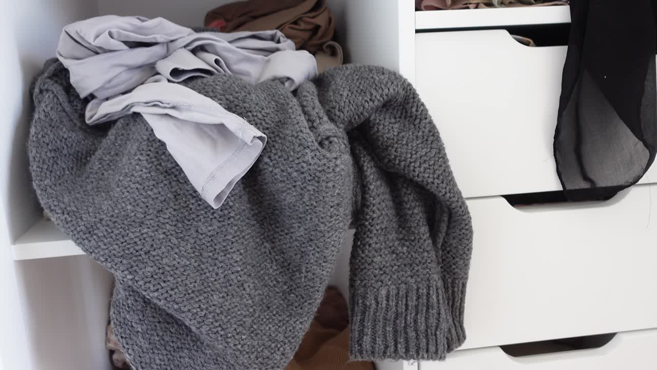 Disorganized Clothes in a Drawer and Closet