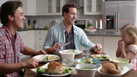 male gay couple and daughter dining in their kitchen, shot on r3d