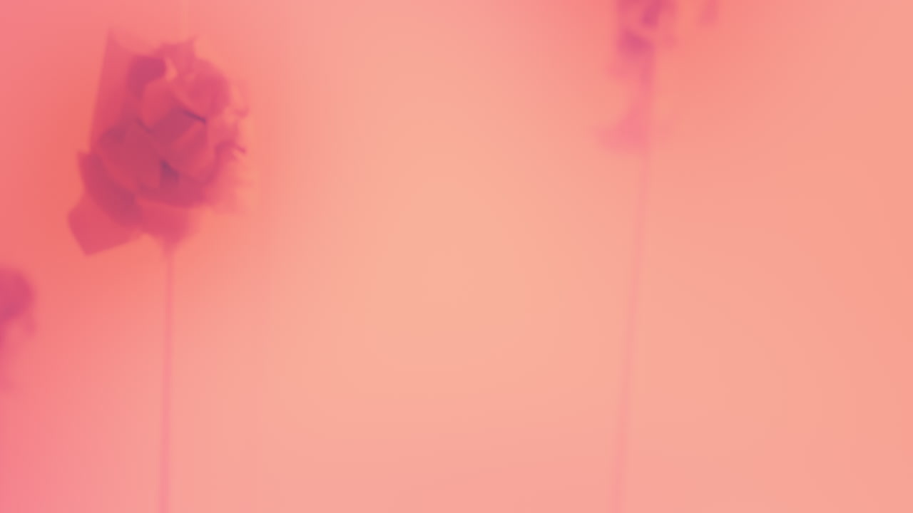 Destroyed android heads on spikes on the neon pink background