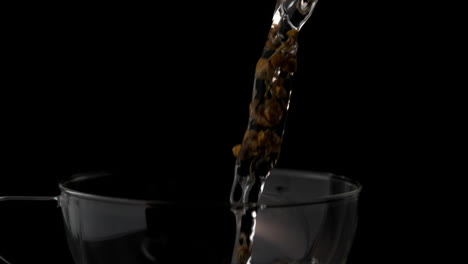 Water-pouring-into-glass-teapot