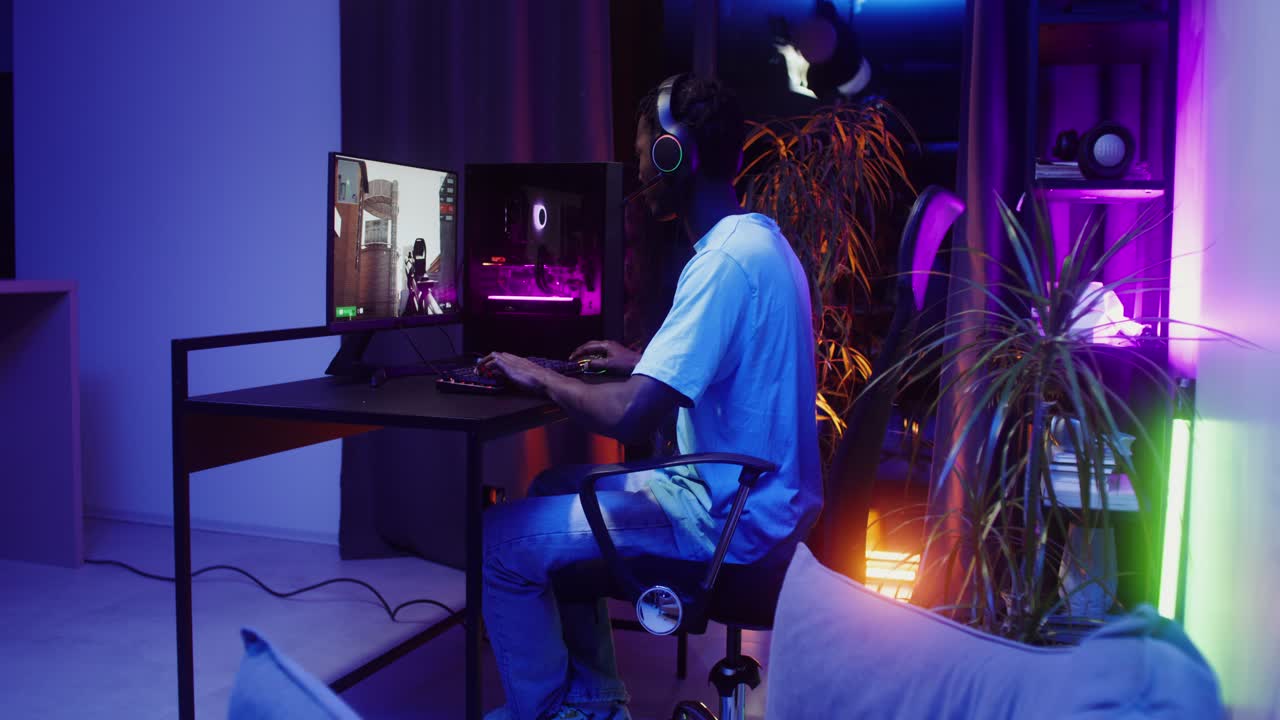 Man playing video game on computer