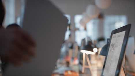 business-people-working-late-using-computer-team-leader-woman-sharing-information-with-colleague-giving-feedback-discussing-solution-for-project-deadline-in-office-at-night