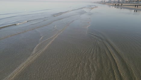 A-drone-shot-over-the-Adriatic-sea,-shoreline---Italy