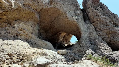 A-large-rock-arch-in-Sudak,-Crimea,-Russia,-viewed-from-below