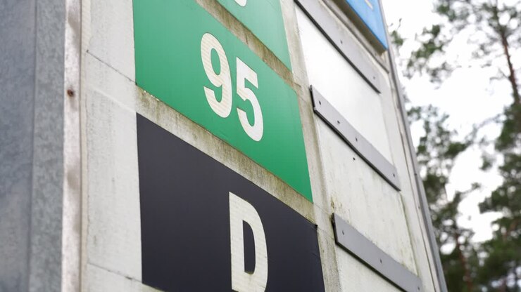 Close up of abandoned and post apocalyptic gas station sign