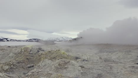 Strong-wind-blow-hot-vapor-from-steam-vent-in-overcast-day-in-Iceland