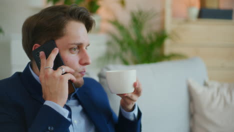 businessman discusses over coffee