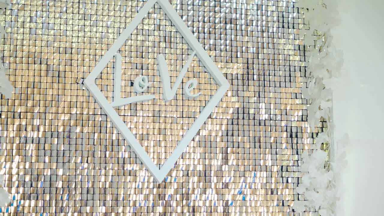 Luxury golden mosaic. Pattern and background of an artificial golden glitter