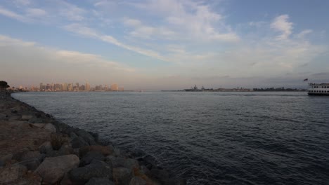 4K-Timelapse:-Golden-Hour,-Downtown-San-Diego,-Coronado-Bridge,-Naval-Base,-Fishing,-Boats,-Sailboats,-Summer-Day,-Beautiful-Clouds,-Moon-Overhead