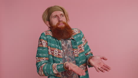 confused man with red beard and headband