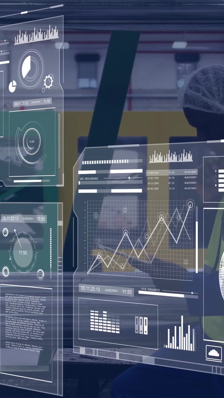 Male warehouse worker reaching for tablet tapping hologram dashboards overlaying, monitoring charts