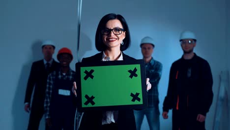 businesswoman with chromakey plate