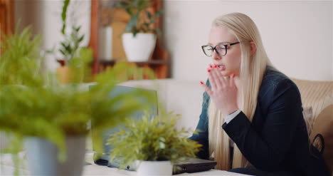 female entrepreneur using laptop in office 4