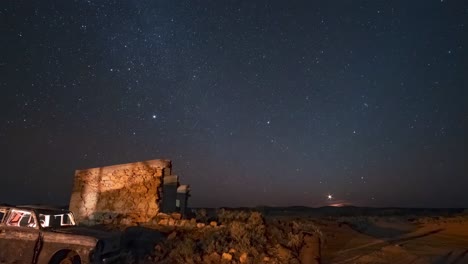 timelapse of the milky way rising over an abandoned homestead and car in far western nsw