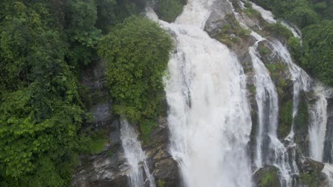 aerial view over wachirathan waterfalls. dolly right