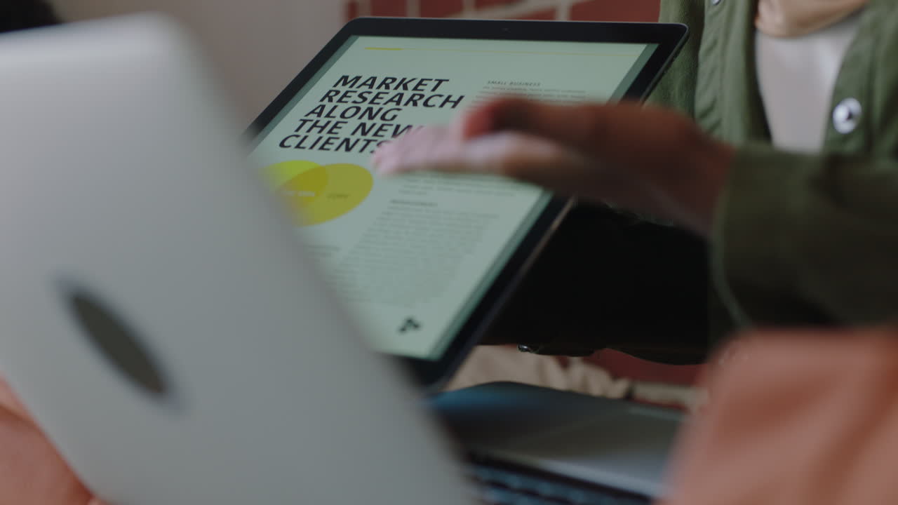 business people brainstorming team leader woman using tablet computer sharing creative market research ideas for startup project presenting marketing training office presentation close up hands