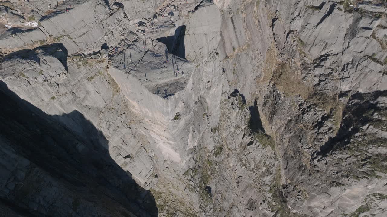 Inspiring Pulpit Rock (Preikestolen) Norway 4K Drone Footage Orbital Shot high in the sky. High-altitude orbital shot showcases the iconic landmark in all its glory. Perfect for any project.