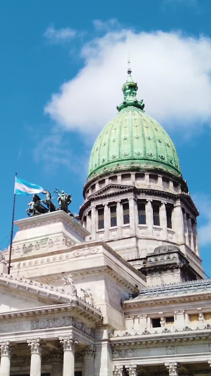 Historic Argentine Congress Building with Green Dome and Columns in Cityscape, Vertical view