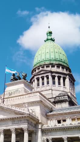 historic argentine congress building with green dome and columns in cityscape, vertical view
