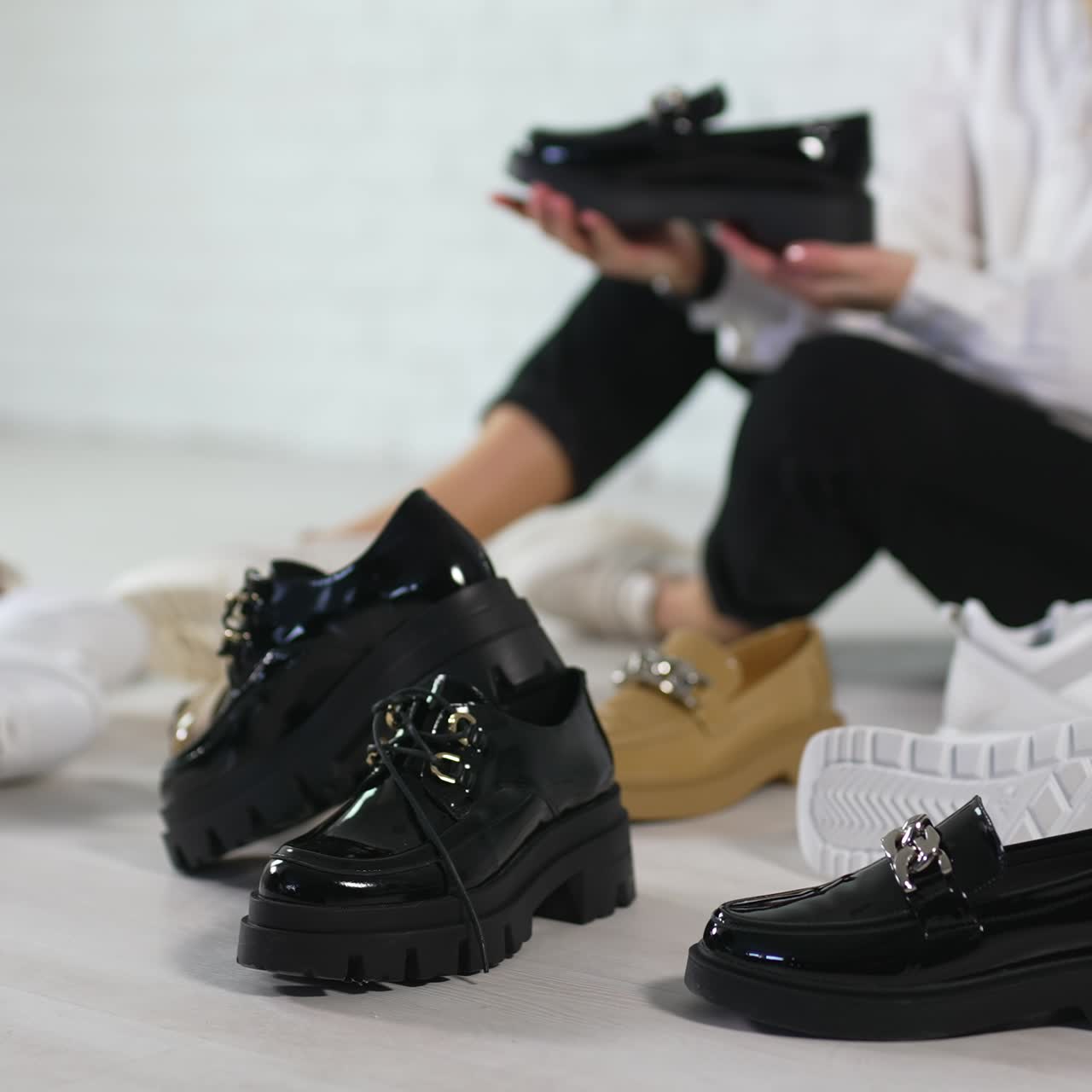 Fashionable choosing female shoes. Choosing styulish shoes