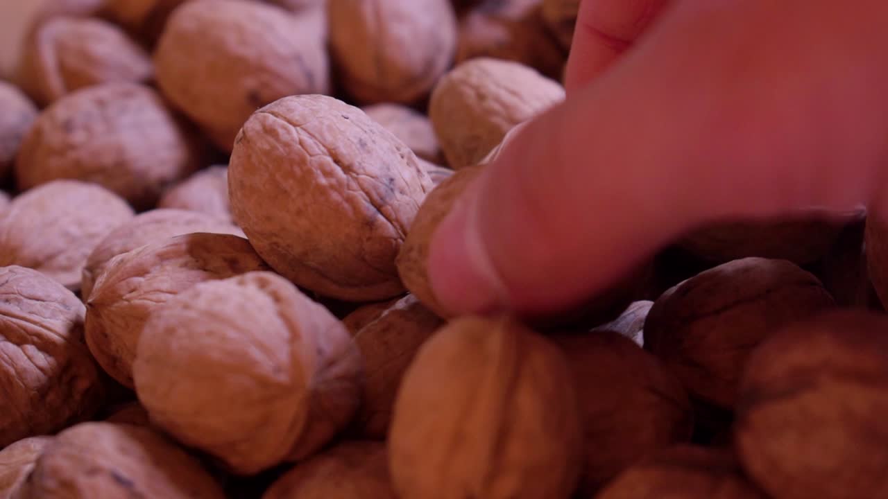 Dried walnuts in a wooden bowl-7