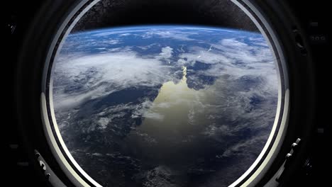 earth through the big porthole window of spaceship. international space station moves to the right. realistic atmosphere. iss. 4k.