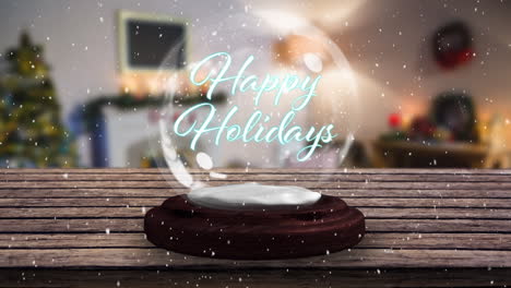 happy holidays on a snow globe