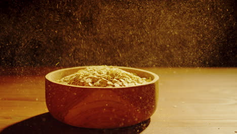 pouring oats into a wooden bowl