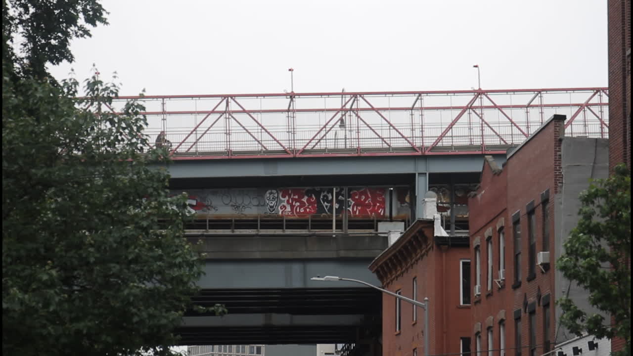 City Bridge with Graffiti and Cyclist