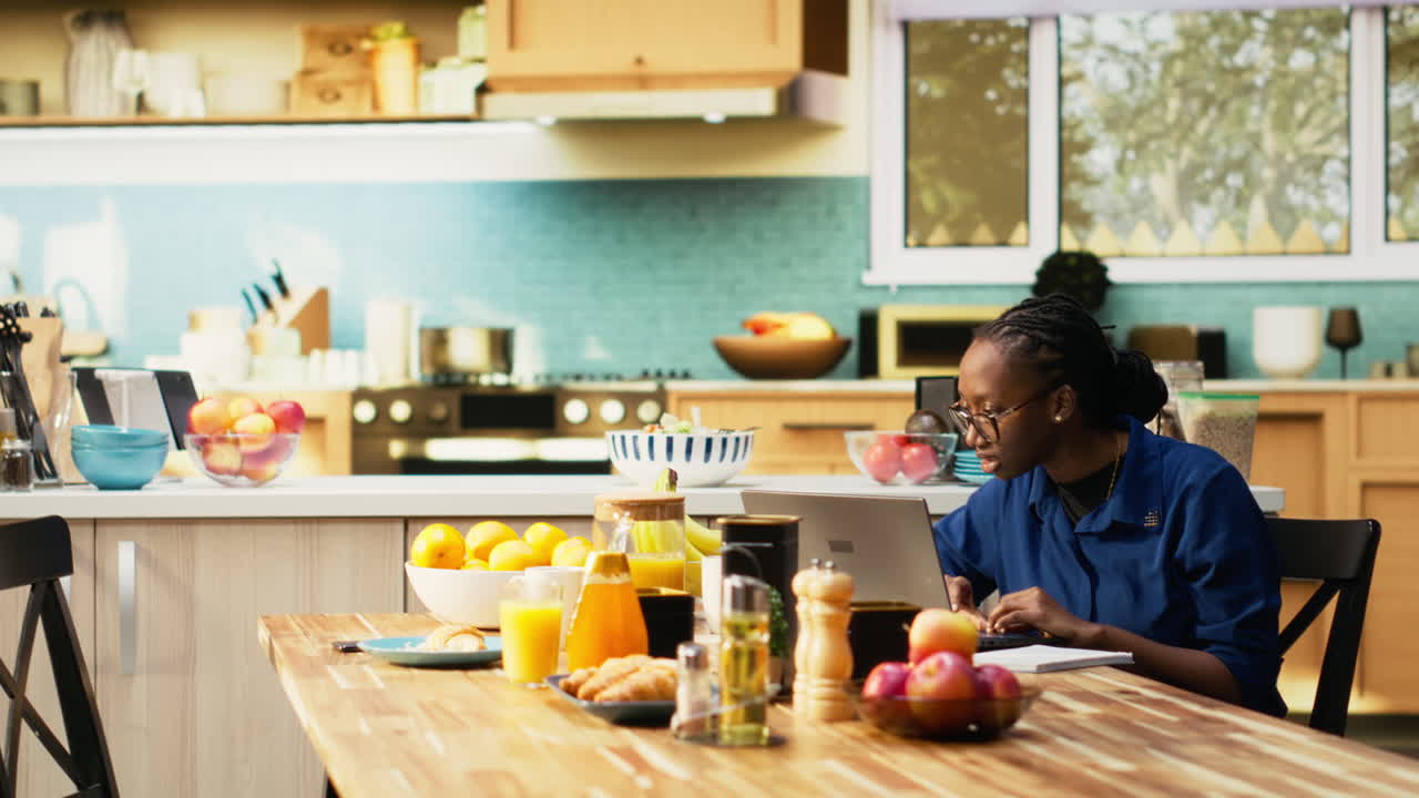 People having breakfast in the kitchen