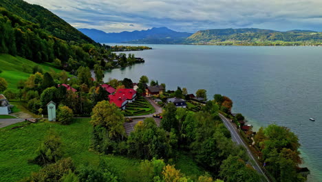 Panoramic-aerial-view-of-the-twelve-mile-long-lake-Attersee-in-Austria