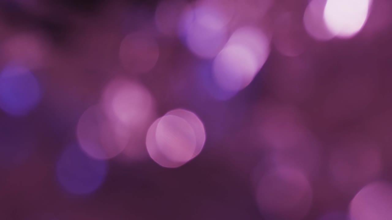 video de puntos de luz bokeh blancos y rosados parpadeantes con espacio de copia